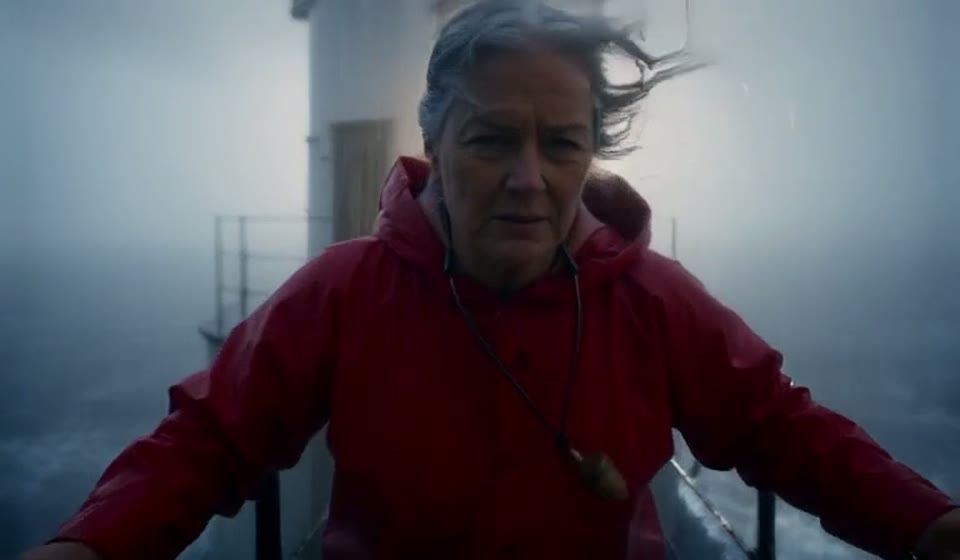 A lighthouse keeper in a storm